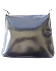 1970s GCCI saddle bag in black leather with muted gold hardware, an expandable bottom, wide shoulder strap, and burgundy leather lining