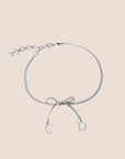 CHRISTIAN D1OR BOW SILVER NECKLACE