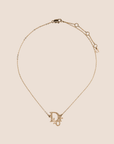 CHRISTIAN D1OR 2000s GOLD CRYSTAL LOGO NECKLACE