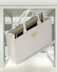 Medium leather PRD Symbole bag with topstitching