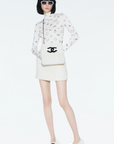 *HOT* CH Coco Neige 25/26 Ecru and Black Shearling Lambskin Muff Bag with Black CC Logo and Champagne Gold Chain Detail