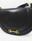 'Cosci' by GCCI black leather two way saddle bag with gold equestrian accents