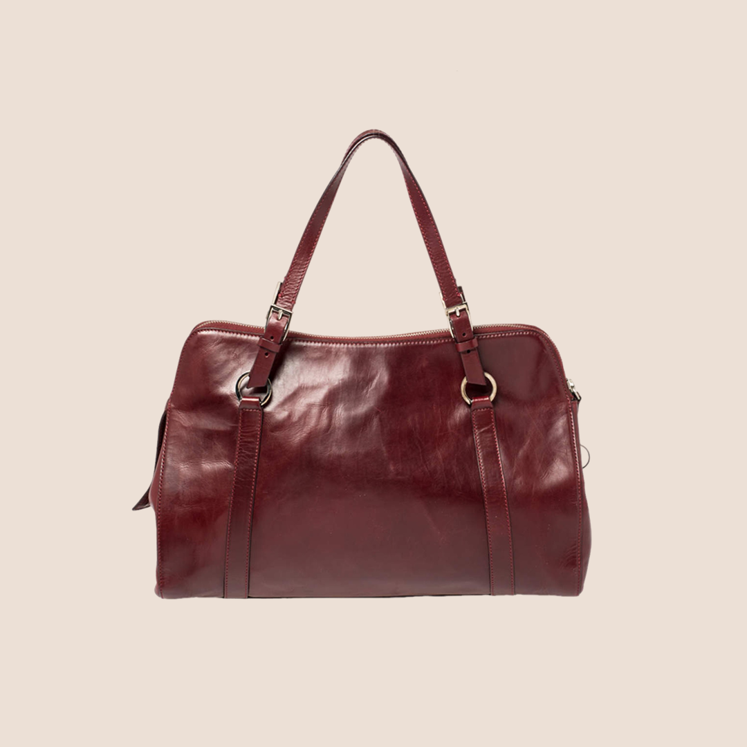 CHRISTIAN D1OR BURGUNDY LEATHER PIERCED HARDCORE TOTE BAG